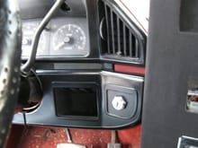 black

key switch mounted on dash with push button starter under the dash