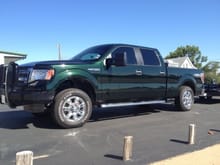 My newest F150, 2013 Green Gem, tow mirrors, 6.5 bed, Super Crew, Ranch Hand front bumper replacement.