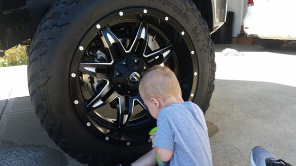 My little guy helping me clean my wheels lol
