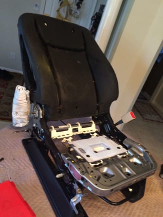 Passenger seat stripped down, be careful
