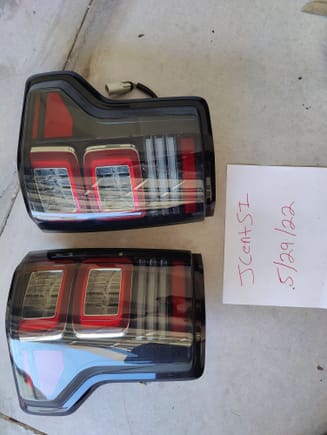 Vland LED taillights $160. Plug and play with both harnesses for F150. Slight tint and black housing. Great condition. Running lights are the outside ovals and the red strip across the side. 