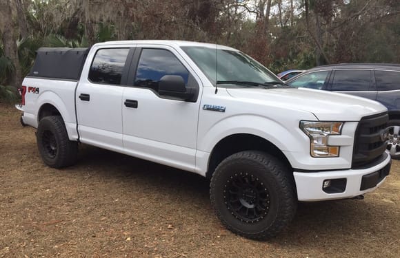 Pro Comp wheels, 2.5" F150 lifts level, 34" Cooper Discover ST Max, Soft topper.