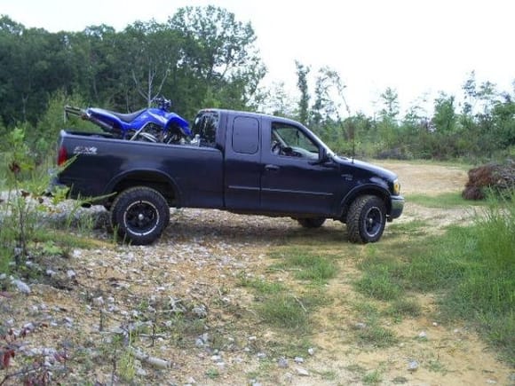 what she looks like kinda clean 
and my four wheeler it only fits without the tool box haha