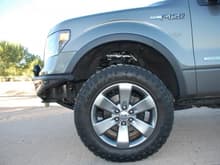 Factory FX4 wheels mounted with 1.5-inch wheel adapters and Goodyear Duratracs LT285/60R20 (33.5 inches tall)