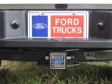 Detail of my &quot;Ford Trucks&quot; license plate and &quot;Built Ford Tough&quot; hitch cover.