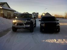 Next to her younger brother's truck