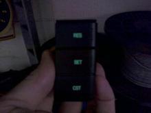 Cruise control switch in factory green.