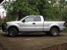 FeFay gets new shoes.  (265 Rick Cepek Mountain Cats w/ additional Siping added to the center two Lug Rows).  Fills the wells a little better.  
Rims are next.  
It only took me six months to actually mount the new tires.  Maybe I'll get the Rims done a little faster - right 'JD'?