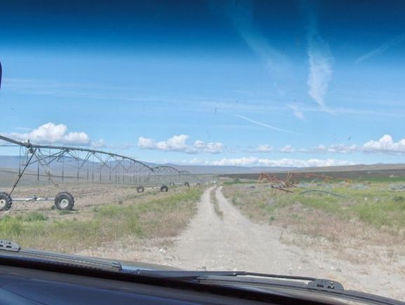 towing trailer down 'road' guided by GPS