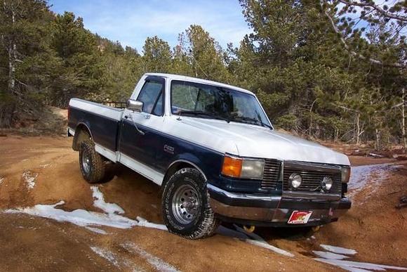 Exploring old mining roads in Colorado.  It was a 'Truck'.  Nothing fancy, nothing automatic, leave it stock, let it live.  XL pkg, 5.0 Ltr w/ shorty headers, Elct Fans, K&amp;N.  4spd manual.  No lift - just removed the rear sway-bar for axle artcltn.  Open Diffs, skid plates and 31x10.5 R15 Tires.
