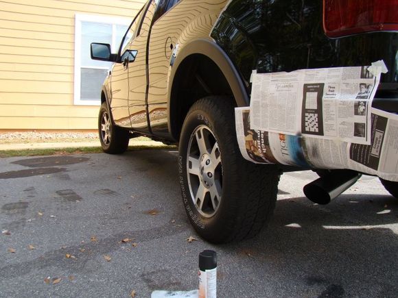 Painting exhaust tips.