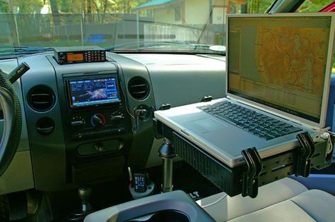 Powerbook 15.2" with Internet connection, also visible is Alpine's SBS-05DC in-dash center channel speaker