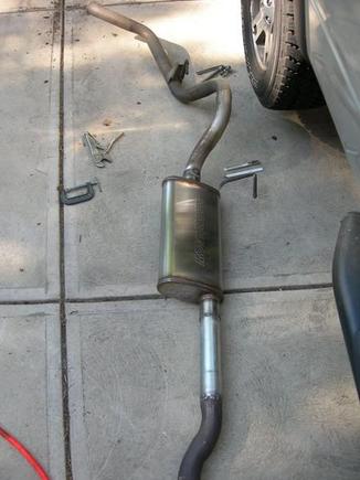 New Magnaflow Muffler, #11256 fit pretty well.  Ignore the rough welds...  :o)