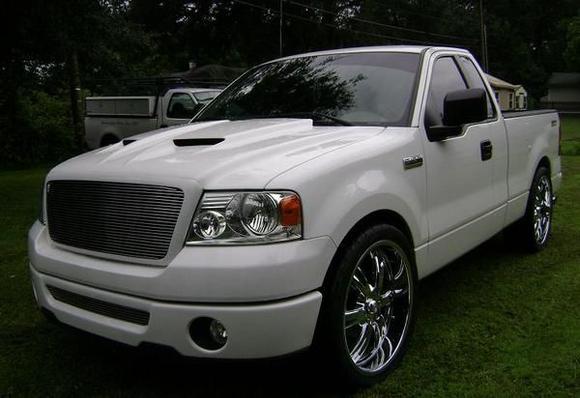 Cervinis functional Ram Air Hood. Custom Billet Grille. Tinted Windows. 2/4 Drop