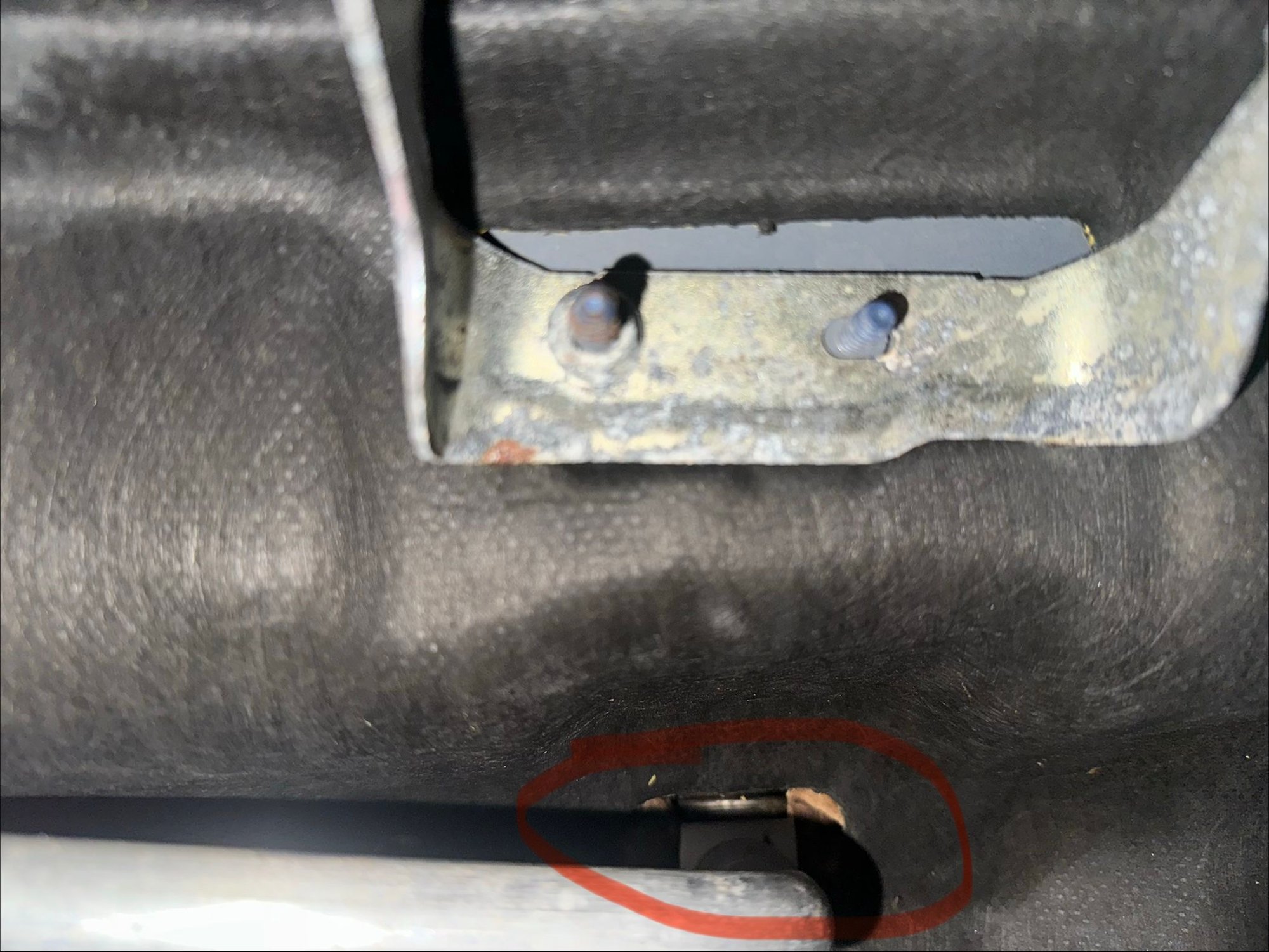 Stupid nuts trapped in the engine bay liner