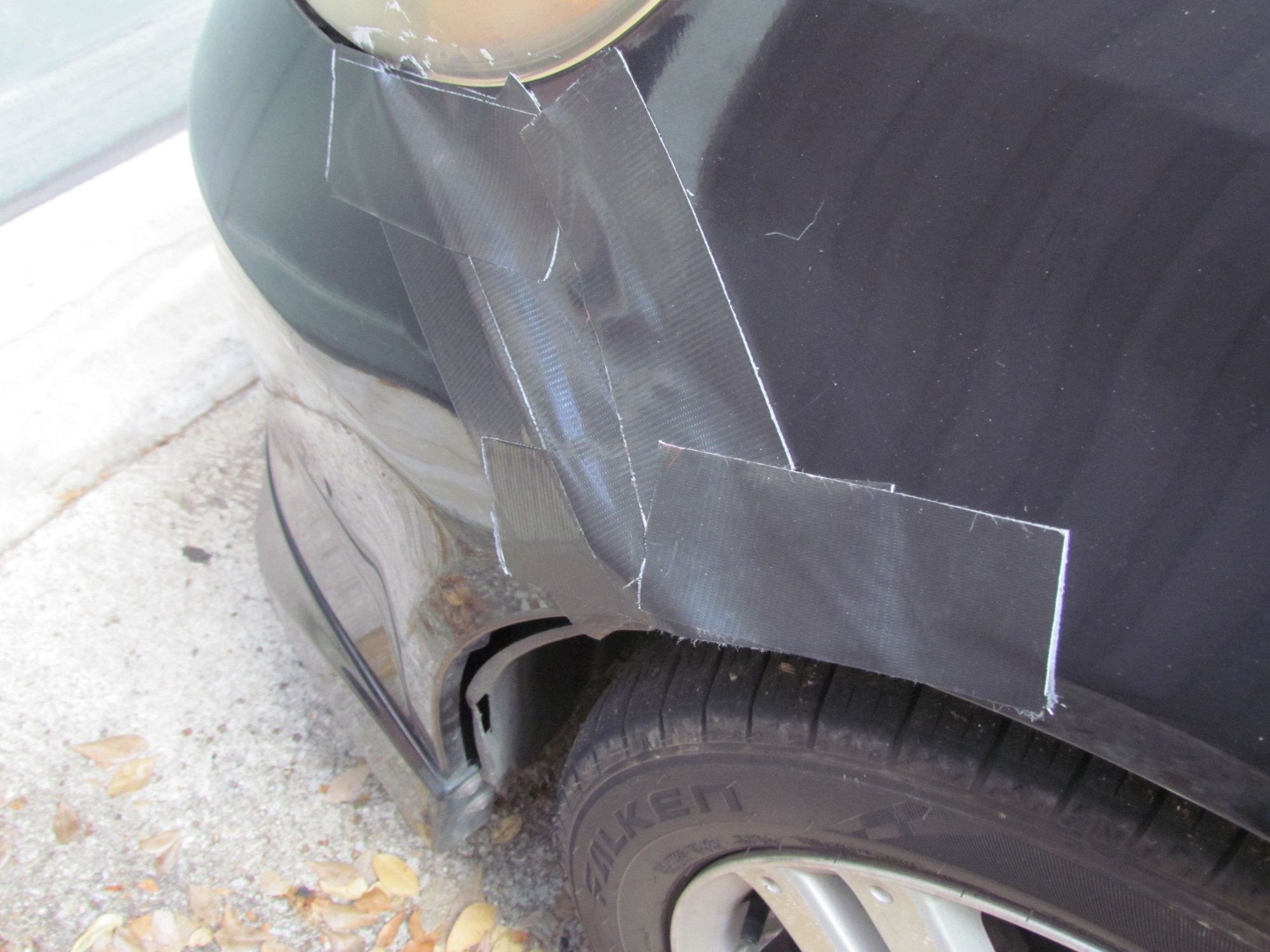 Duct tape on both sides of my front bumper. The one thing I wish Honda Japan hadn�t added is the air dam under the front bumper � I�ve caught that thing on so many parking curbs it�s been pulling the bumper loose for years.