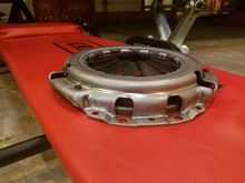 new plate with fingers extending up out of assembly