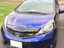 Finally got around to install the front RS emblem... only hard part was finding the right screw size to use.  Broke the rear brackets so it would fit.