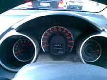 5.5 l/100km!!! Translates to about 43 mpg(US) on the gauge or 39 mpg(US) in reality

Photo taken sitting at the lights (not driving!)