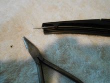 As you come to the end of the metal spine installation (as shown) You can use the needle nose pliers to slide the metal spine into the final position. Total time for a novice was 15 minutes !