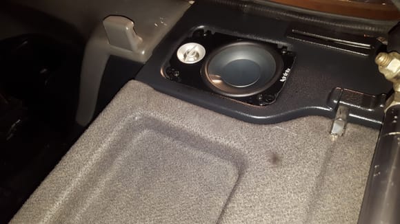 Infinity speakers fitted into package tray.