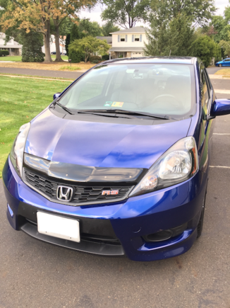 Finally got around to install the front RS emblem... only hard part was finding the right screw size to use.  Broke the rear brackets so it would fit.