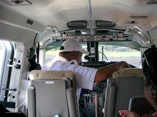 one lucky person actually gets to sit next to the pilot as all 9 seats filled up
