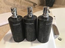 Refillable containers with bath products