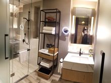 Bathroom + Shower. No tub though. 