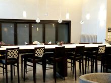 Breakfast room taken at afternoon arrival, business center off to the right. 