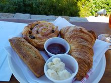 Pastry basket - croissant was good though a bit greasy, bana bread was dry and bland (I think it was GF?), raisin pastry was awful.  Skip this until they get a better pastry chef.  Served with strawberry jam and herbed cream cheese chunky glop.
