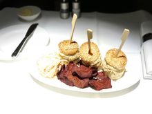 Three Mini Chicken Burgers with Vegetable Julienne, Wasabi Mayonnaise, Miso Sauce, Tomato, Iceberg Lettuce, Coleslaw and Beetroot Chips