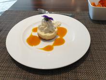 NY Style mini cheesecake with passion fruit reduction