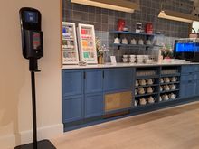 Tea and coffee area   ( coffee machine to right just oos). Separate curtain area to right would have the evening snacks)
