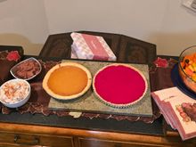 Left to right, pecan pie, cinnamon and chocolate whipped creams (I know, I know, I'm a purist), pumpkin pie, cranberry curd tart (lots more on this one in the "Vent" thread).