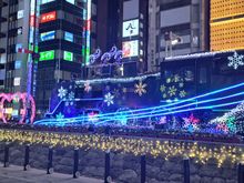 The steam locomotive outside Shimbashi JR station with Santa