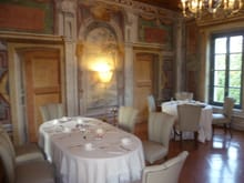 Close up of dining tables and restored walls