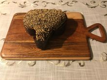 The chocolate & hazelnut colomba  with a chunk sliced off