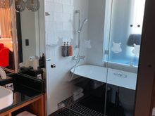 Spacious Bathroom with a Shower + Tub combination that worked very nicely during our stay. 