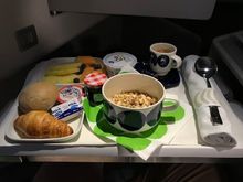 Before landing, I opted for light breakfast. It included yoghurt, granola, fresh fruits and blueberries, croissant with strawberry jam and bread roll. In addition to instant coffee, espresso and cappuccino was also available. American breakfast with omelette and sausage was also available and so was a Chinese one which was noodles.