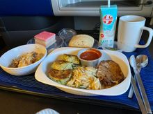 UA 201 HNL-GUM lunch which I choose the veggie option again. That guava cake for desert is always a winnah. Bread role is warm.  