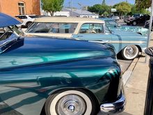 Three custom cars. My dad’s is the blue and white one. 