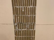Disintegrating tile in the in-room shower