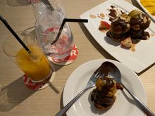 With Thai milk tea - diluted with lots of ice cubes 