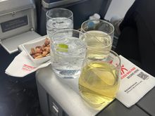 Warm nuts, drinks and towels were passed out. 