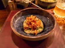 Sunchokes with skyr (Icelandic cheese/yogurt) and dill. This dish featured sunchokes several different ways, including roasted, pickled, and as you can see on top, dried. Really nice mix of flavors and textures.