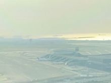 Landing through the dawn mist at…