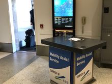 New passenger drop off area (former taxi stand). Happily, there are personnel there to assist with directions and wheelchair assistance. 