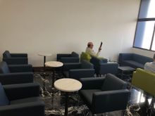 Side lounge area with additional seating and (limited) apron view. 