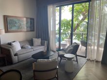 Beach House 1 bdrm suite - living room w/ sleeping sofa